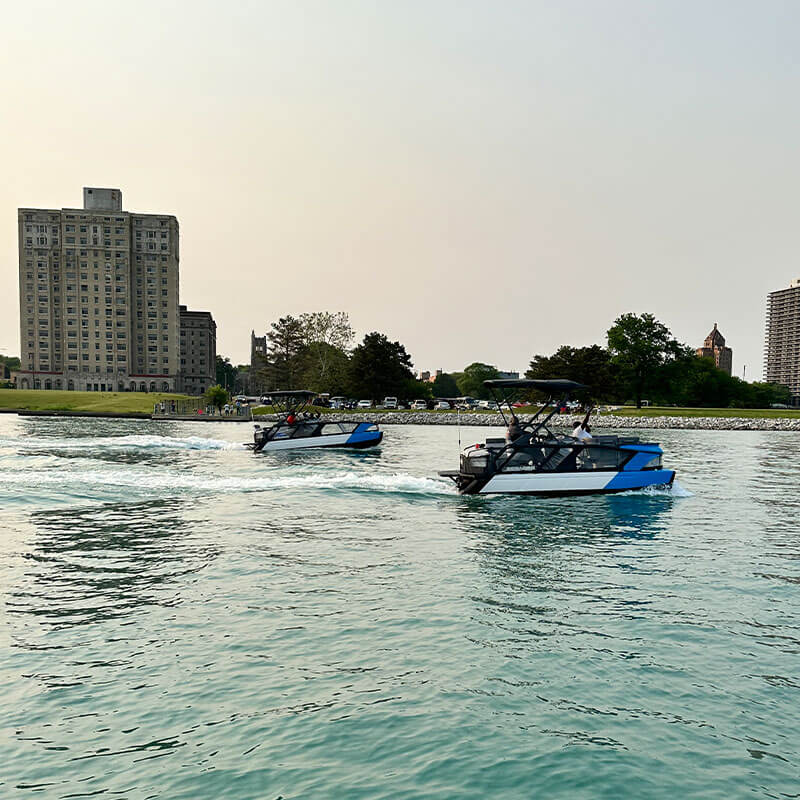 two boats on the water during the day